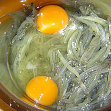 Break two eggs into 250gms of whitebait